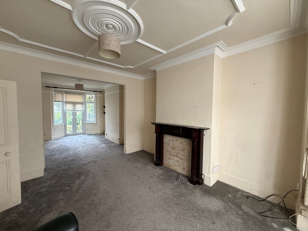 Lot: 142 - THREE-BEDROOM MID-TERRACE HOUSE FOR IMPROVEMENT - Living room - view 1